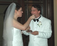 047a-Wedding Reception - Eating the Cake 09-18-2005.JPG